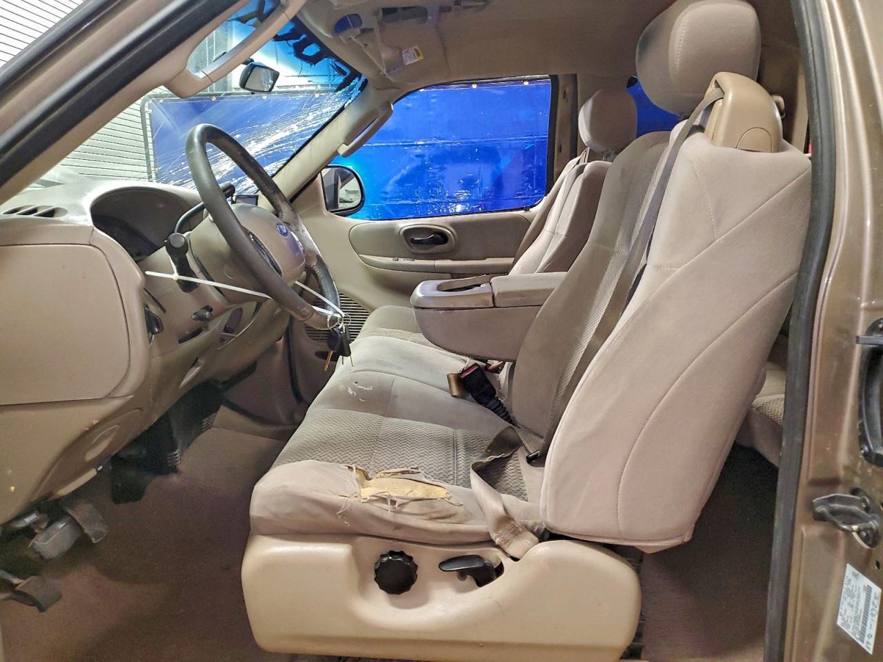 2003 Ford F150 - Фото 7