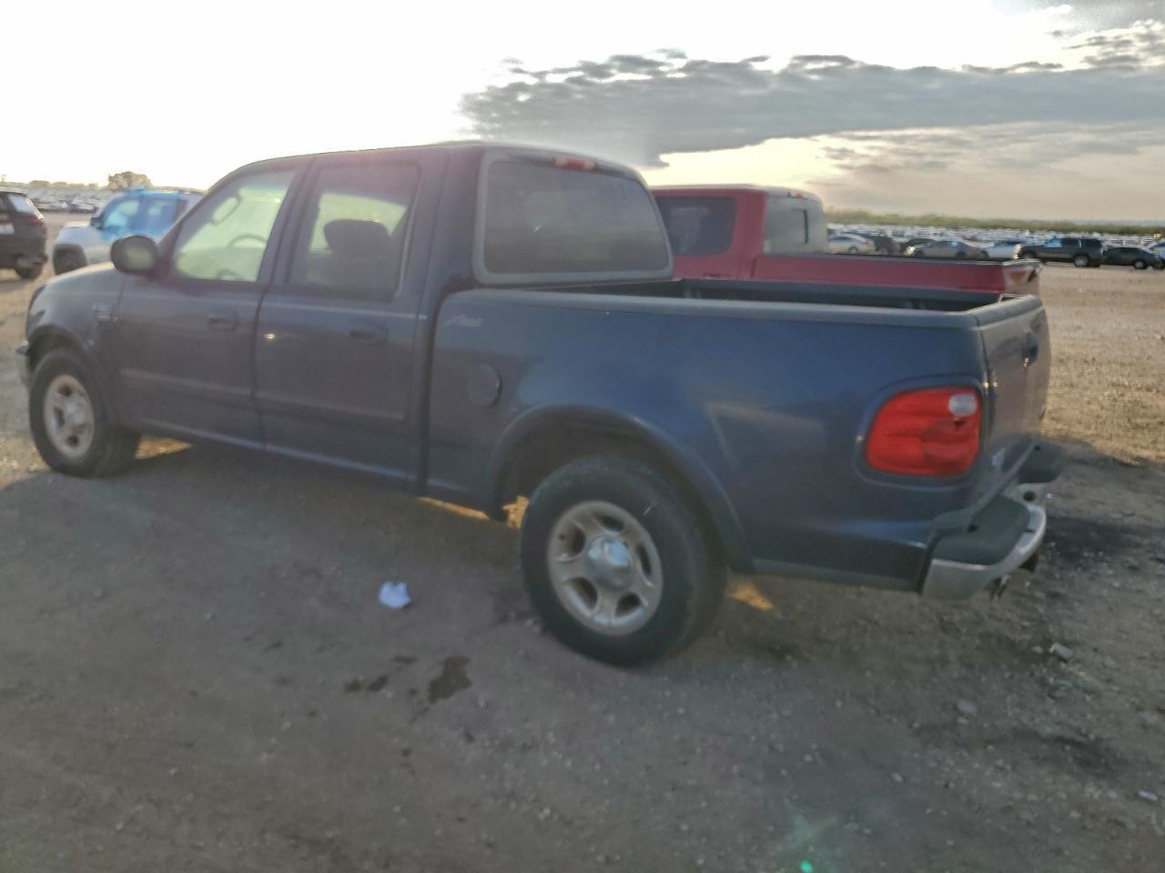 2003 Ford F150 - Фото 2